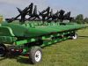 Crop sweeper on combine head trailer