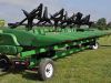 Crop sweeper on combine head trailer